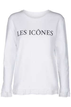 White ladies sweater long sleeve with black logo print artwork with lace cuffs